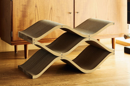 Cat Cellar — wave-shaped designer cat scratcher and hideaway, cardboard, side view
